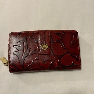 Valentina Embossed zip around reddish burgundy wallet EUC